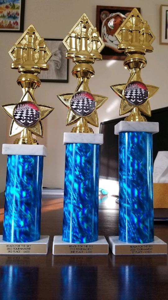 Trophies picked by the family. There are trophy prizes in U1000 and U600. There are gift cards for the Open section.
